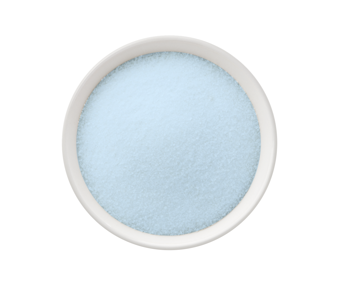 Eight shirts arranged on table in black, olive, grey, blue, white, red, mustard, and green.