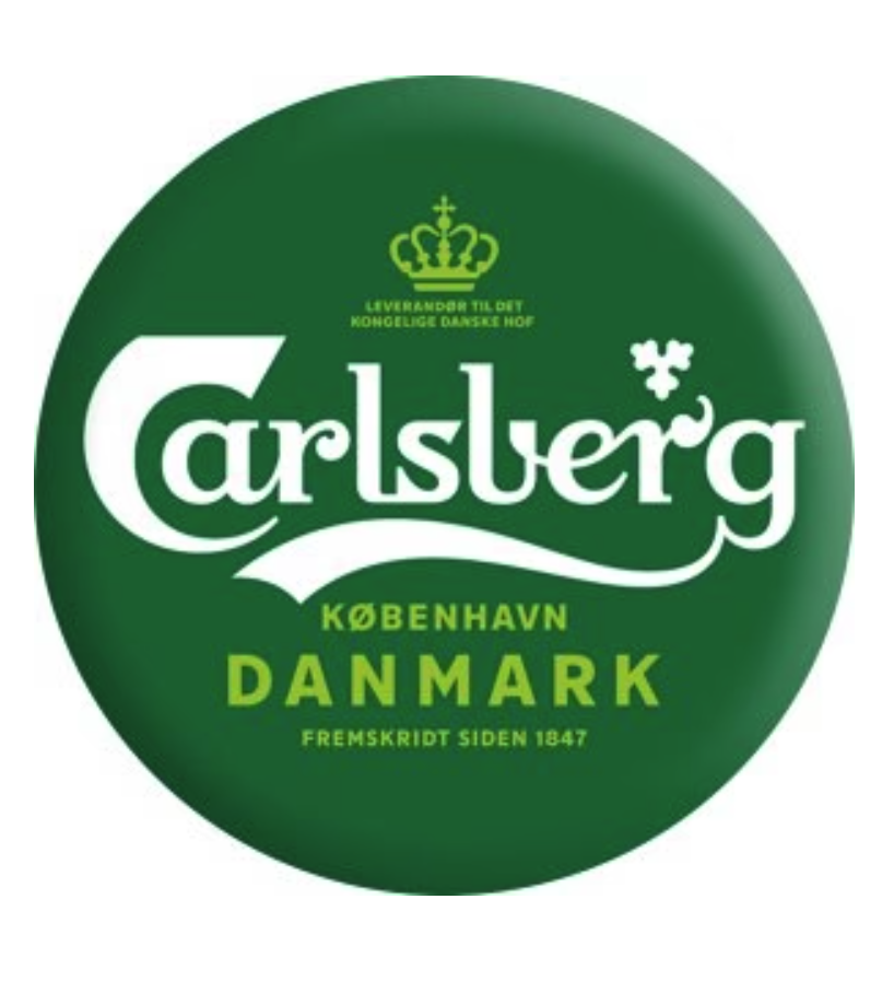 Eight shirts arranged on table in black, olive, grey, blue, white, red, mustard, and green.