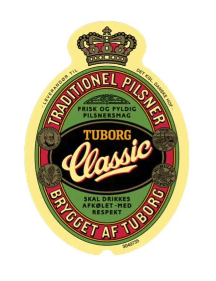 Eight shirts arranged on table in black, olive, grey, blue, white, red, mustard, and green.