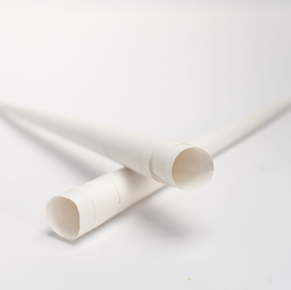 Eight shirts arranged on table in black, olive, grey, blue, white, red, mustard, and green.