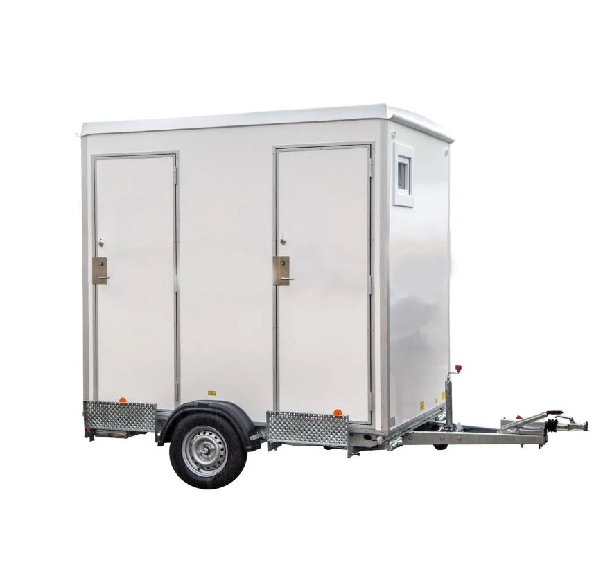 Eight shirts arranged on table in black, olive, grey, blue, white, red, mustard, and green.