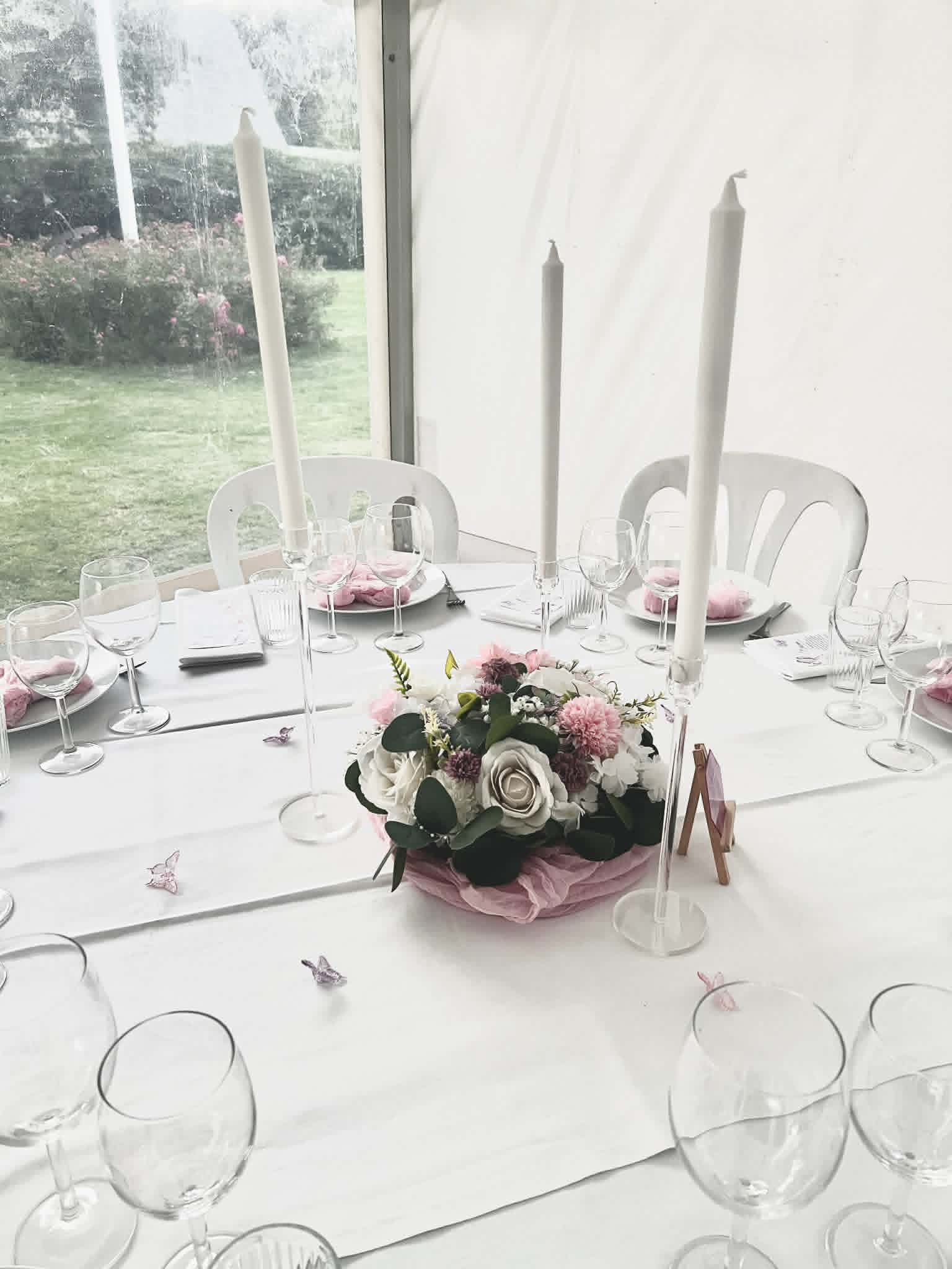 Eight shirts arranged on table in black, olive, grey, blue, white, red, mustard, and green.